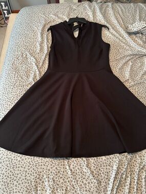 Sleeveless Black Fit-and-Flare Dress with Keyhole Neckline